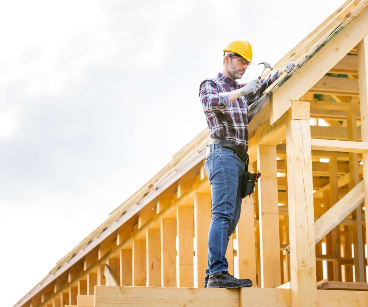 roofer-builder-working-on-roof-structure-at-constr-LW5FL7H.jpg roofer-builder-working-on-roof-structure-at-constr-LW5FL7H.jpg